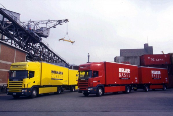 Removal trucks with trailers of Keller Basel and Hofmann Zürich at the Rhine harbour shortly after the takeover - 1999